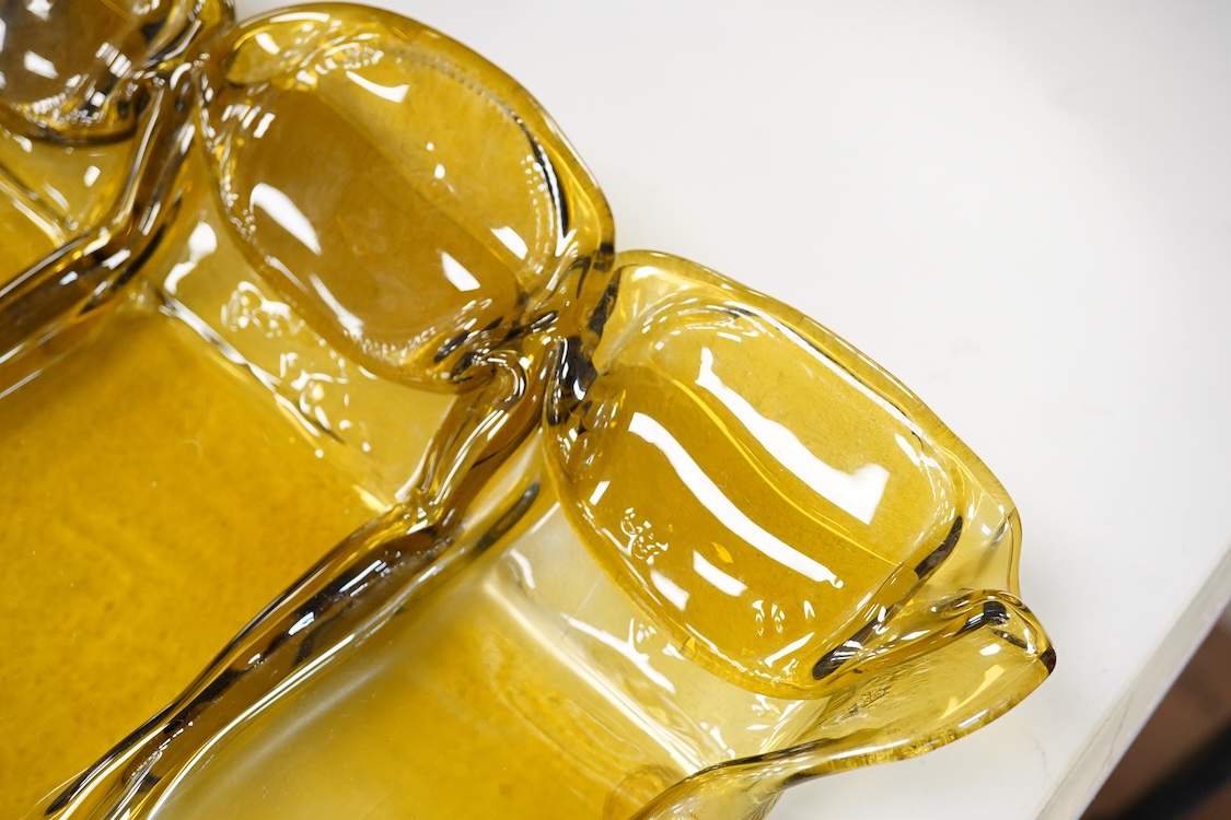 A Mary Canny five sectioned art glass ‘Amber bottle tray, 48cm wide x 24cm deep